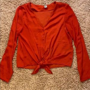 Red bottom tie blouse